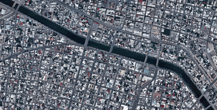 This gif shows extracted features in Reynosa, Mexico, including building footprints, road centerlines, and land cover, mapped using satellite imagery and AI. These vectors help authorities establish a reliable baseline view of the town, enabling rapid detection of anomalies such as new structures, unusual container activity, or shifts in traffic patterns. 