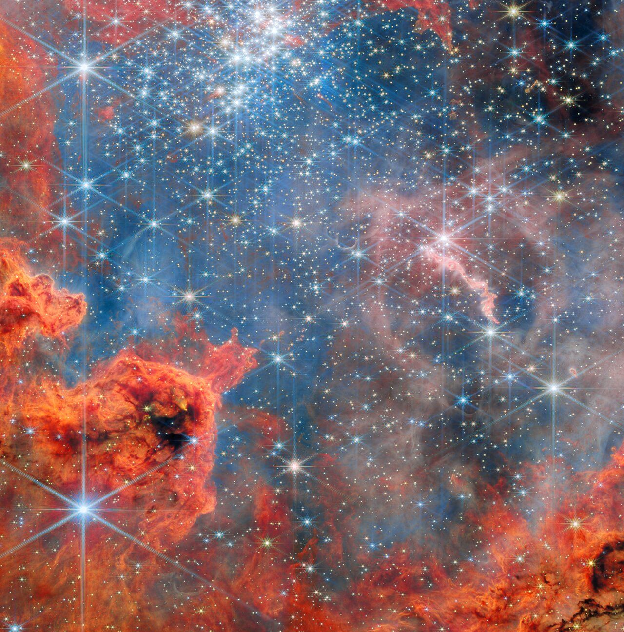 A new James Webb Space Telescope image captures a dense field of dwarf stars in the young star cluster Westerlund 2, located roughly 20,000 light‑years away in the constellation Carina. Webb’s NIRCam and MIRI instruments reveal hundreds of low‑mass stars embedded in dust, offering a clearer view of early stellar evolution than previous optical observations. The infrared data expose structures normally obscured by gas, enabling researchers to study how small stars form and interact within crowded clusters. Westerlund 2 is a key laboratory for understanding how dense environments shape the earliest stages of star formation.