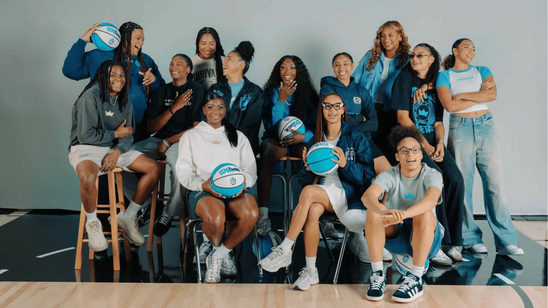 Unrivaled NIL signees sit together in the Future is Unrivaled line 