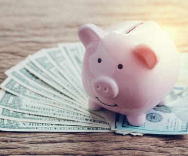 Happy piggy bank cash