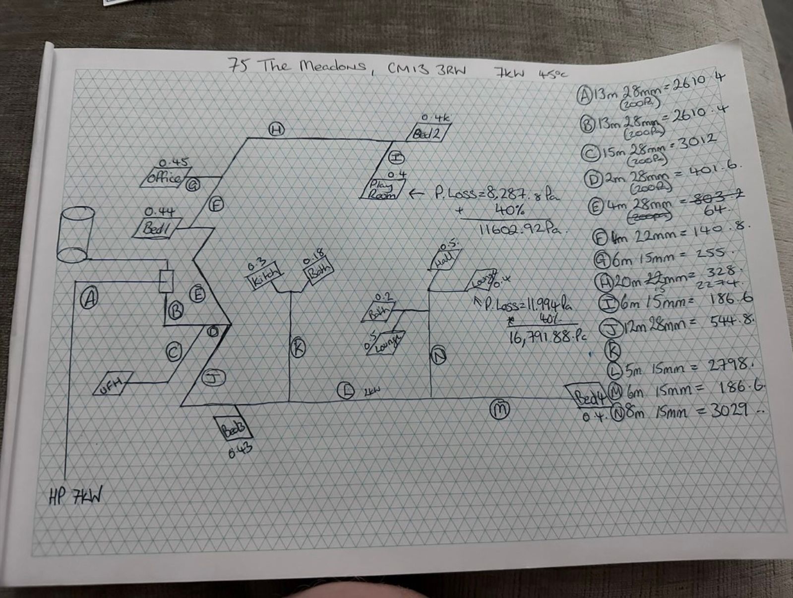 Hand-drawn pipe sizing calculations by Michael Waring for Essex Vaillant aroTHERM plus heat pump retrofit, evaluating index circuit resistance and pump capability.