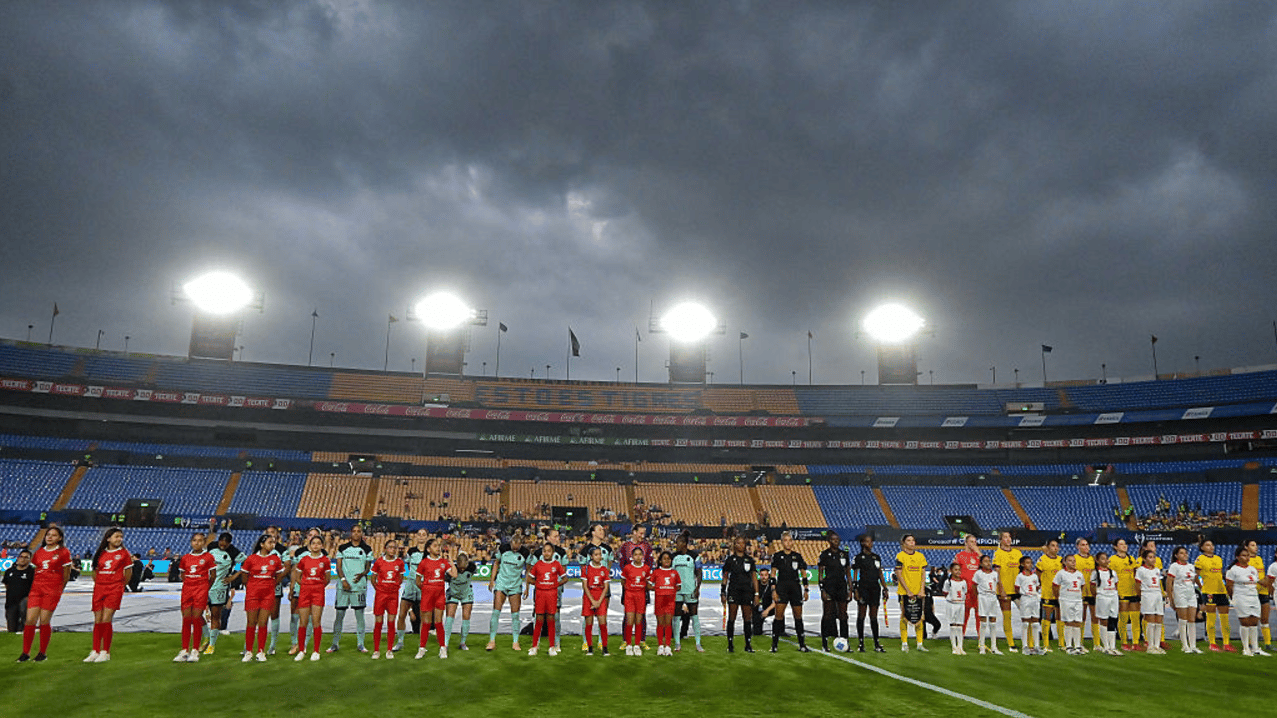 Players of Club America (R) and players of NJ/NY Gotham FC (L) line up prior to the CONCACAF W Champions Cup Semi-final match between Club America and NJ/NY Gotham FC at Universitario Stadium on May 21, 2025 in Monterrey, Mexico.