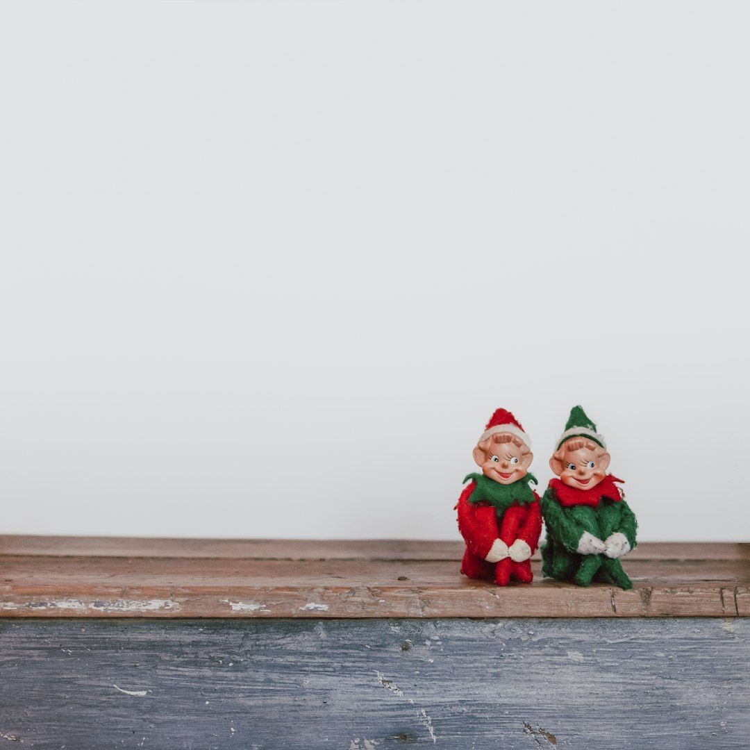 I needed a stock photo of the elf on the shelf for my company’s blog…well, there are basically ZERO options for this…so I made my own, with my own elves! Using my brand new (had it for 3 hours!) Sigma 18-35 1.8 lens, natural light, an antique bench and a piece of white poster board hanging off the back of my couch, I was able to capture “Randy” and “Gary” the elves perfectly for a blog image. I hope that you’ll use Randy and Gary as a pic for your blog too! Enjoy!