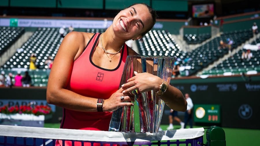 Aryna Sabalenka poses with the champions trophy after defeating Elena Rybakina of Kazakhstan in the womens singles final on Day 12 of the BNP Paribas Open