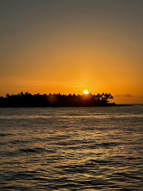 Sun setting behind Sunset Key
