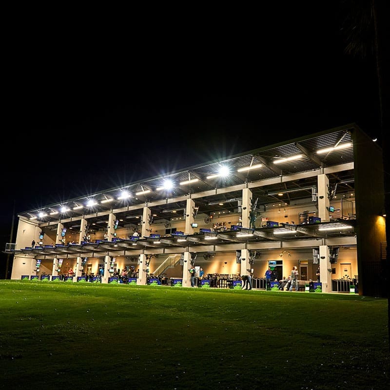 A building with lights on the outside of it