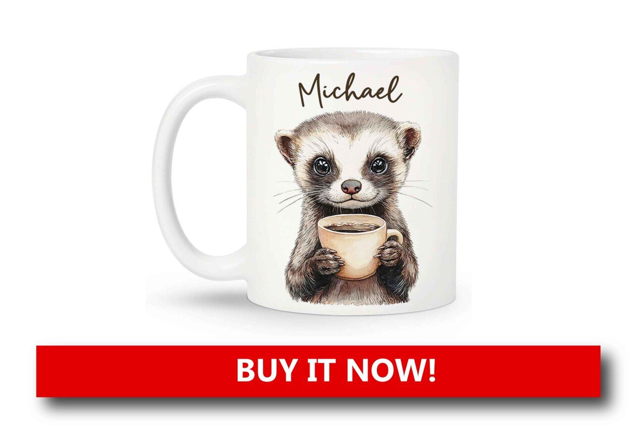 Ferret-Themed Drinkware Alt text: A white ceramic mug with a cartoon ferret and the phrase “Fueled by Coffee and Ferrets,” placed beside a hot cocoa packet and marshmallows.