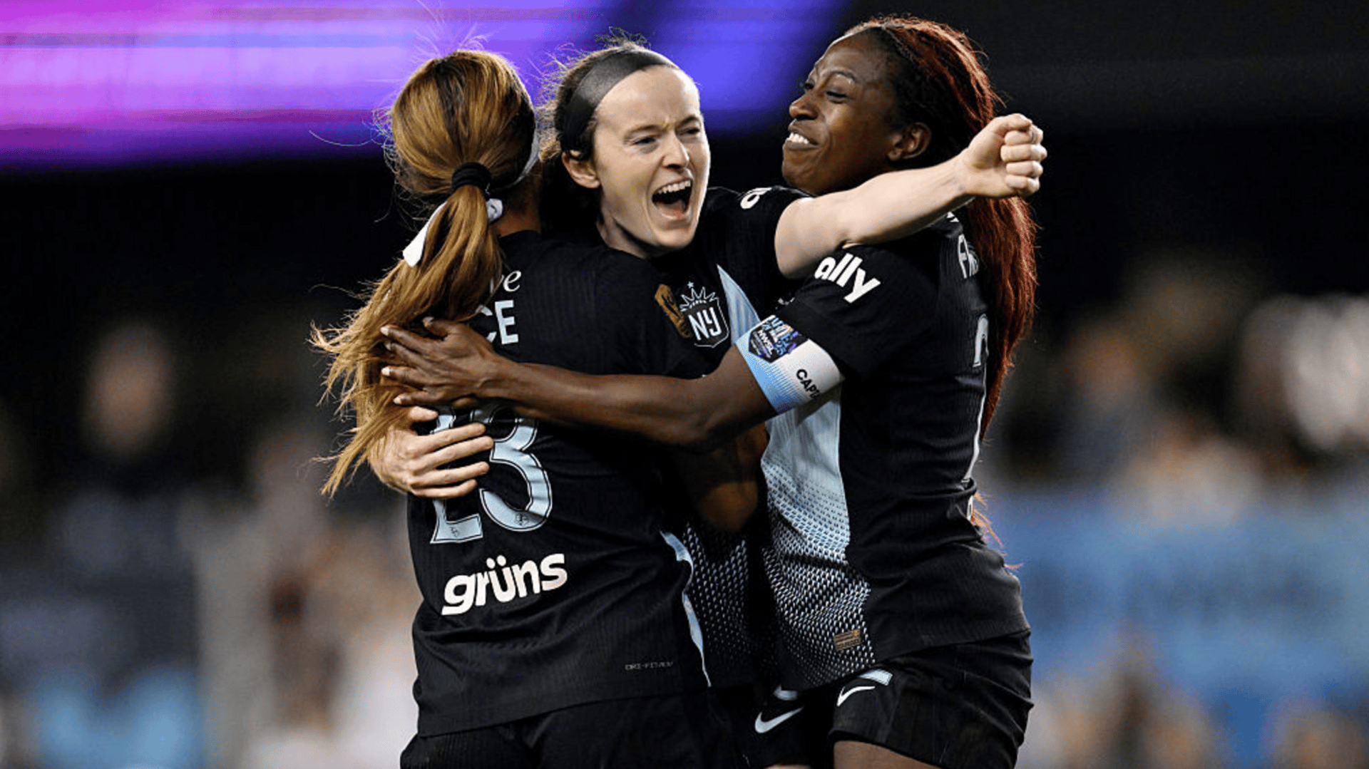 Rose Lavelle #16 of NJ/NY Gotham FC celebrates with teammates Midge Purce #23 and Mandy Freeman #22 as they become champions after winning during the NWSL Championship 2025 final between Washington Spirit and NJ/NY Gotham FC at PayPal Park on November 22, 2025 in San Jose, California.