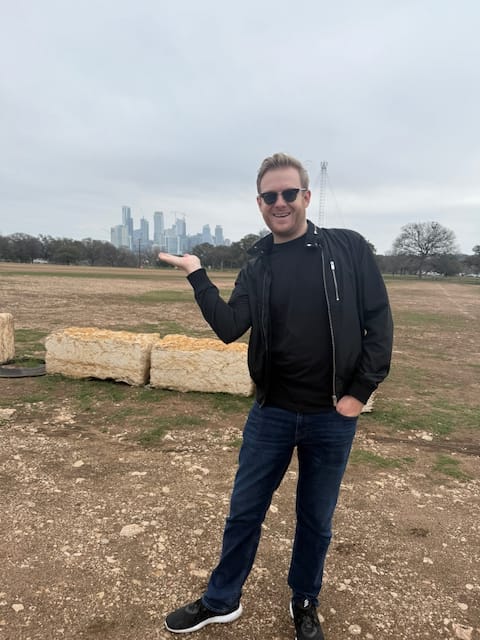 Me pretending to hold Austin on my palm