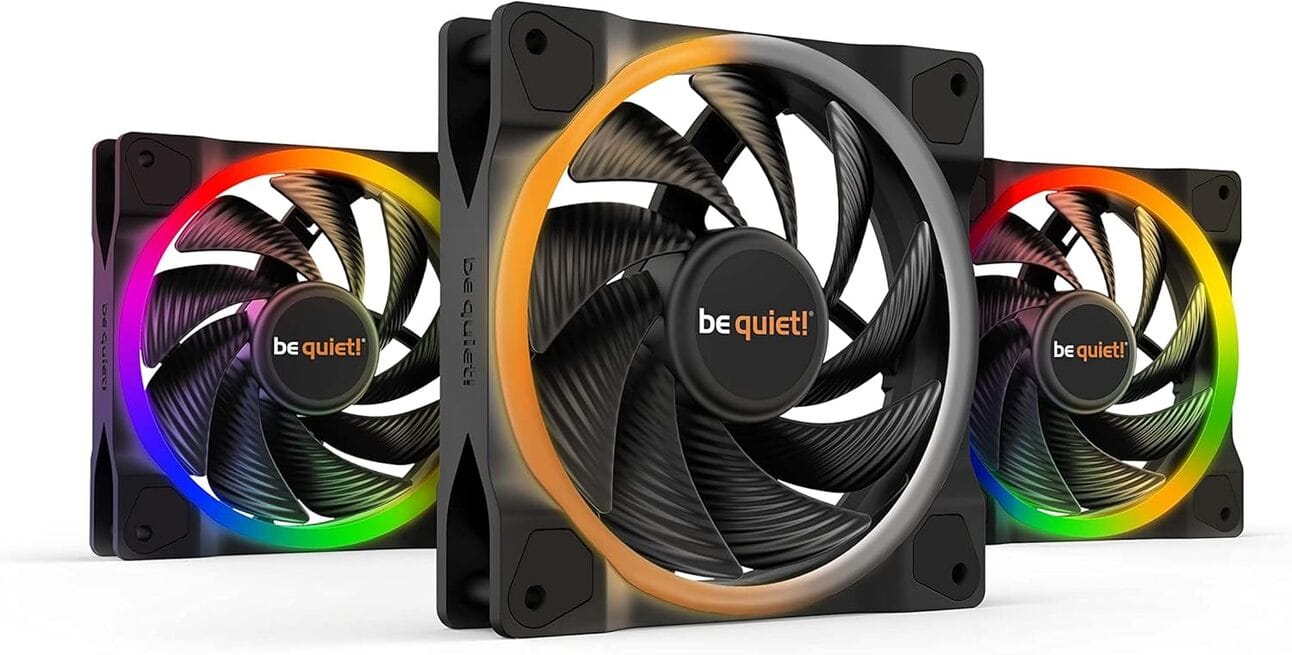 Be Quiet! Light Wings – The Silent Stunner A sleek 120mm RGB fan featuring a quiet light ring effect, installed in a minimalist PC case for gamers who prioritize silence and subtle lighting.