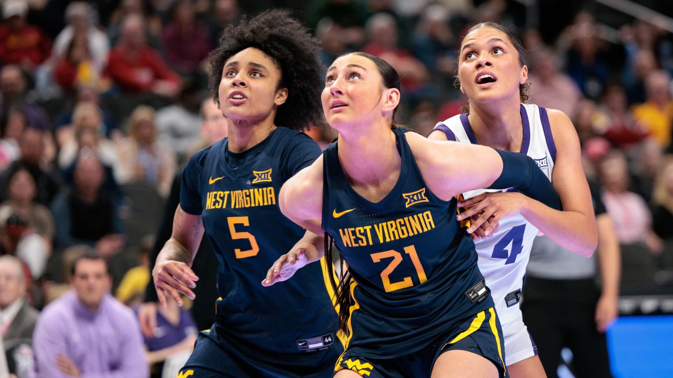 West Virginia Mountaineers forward Riley Makalusky (21) blocks out during the second half against the TCU Horned Frogs at T-Mobile Center.