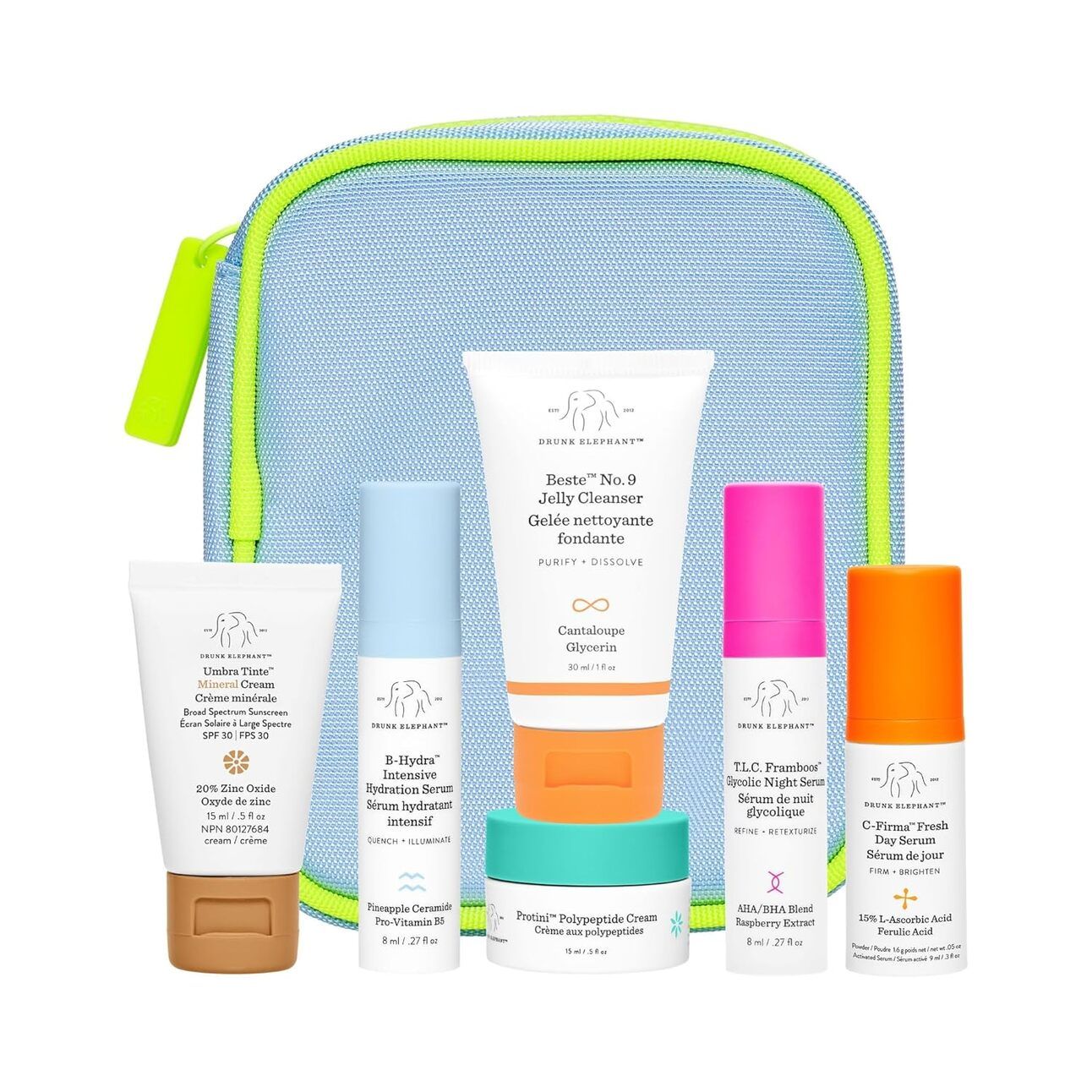 Drunk Elephant The Littles Kit Colorful mini-sized Drunk Elephant skincare products in a playful clear pouch, perfect for travel or first-time users, set on a vibrant background.