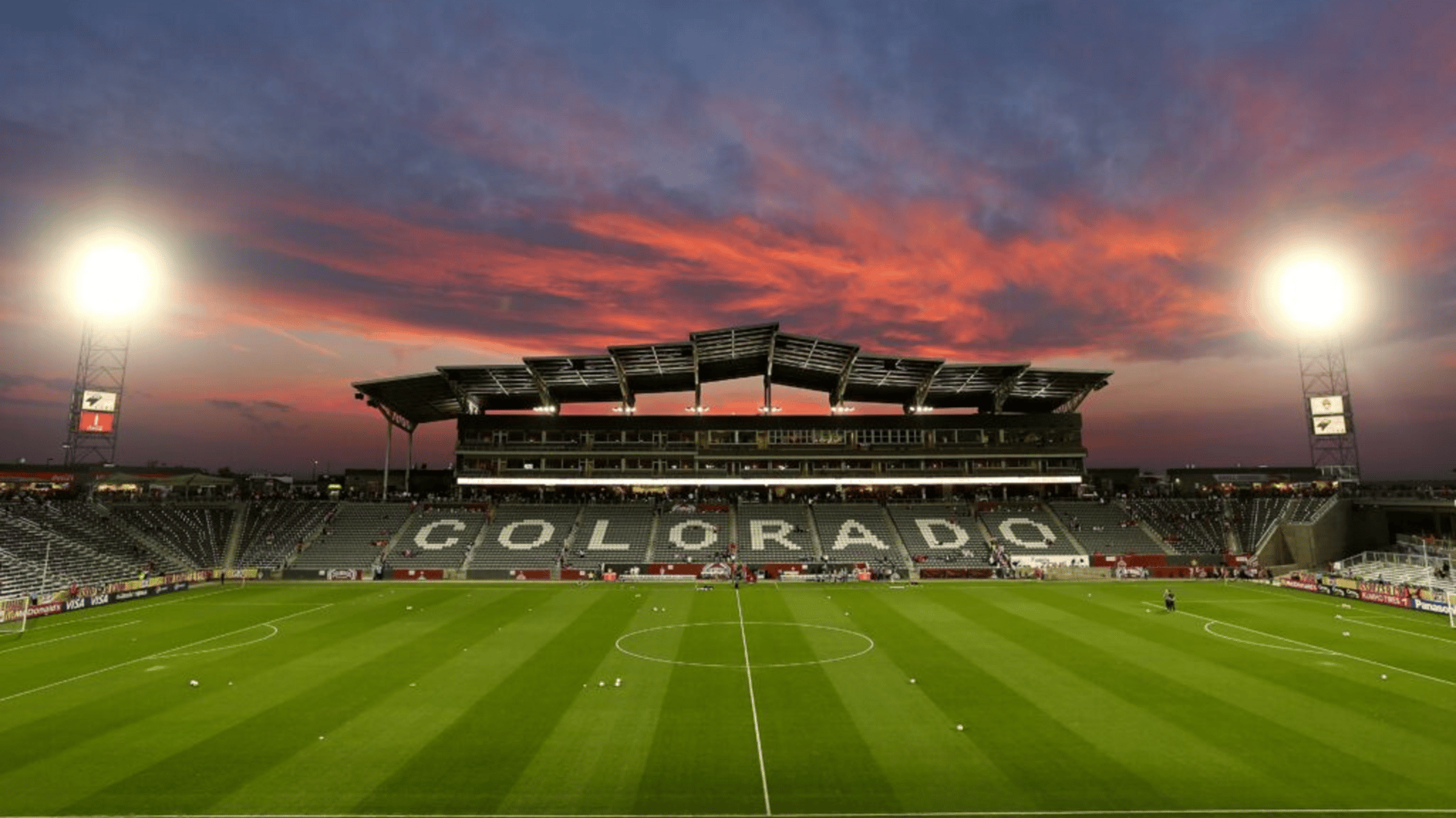 The sun sets over the stadium as Australia prepares to face the USA in a women's soccer game at Dick's Sporting Goods Park near NWSL expansion city Denver Colorado.