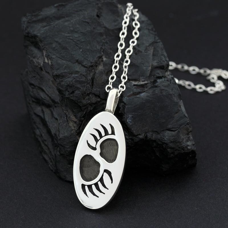 Bear Track pendant by Anthony Honahnie, Hopi