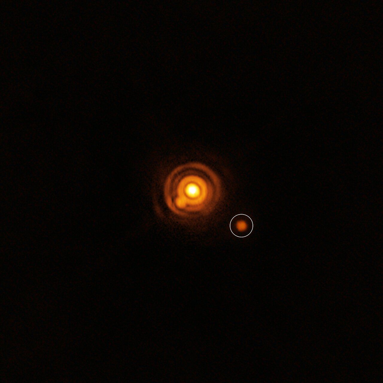 This image, taken with ESO’s Very Large Telescope (VLT), shows a possible companion orbiting the young star V960 Mon. The image was captured with the VLT’s Enhanced Resolution Imager and Spectrograph (ERIS) instrument. The properties of the object are unknown: it could be a planet or a brown dwarf –– an object bigger than a planet that didn’t gain enough mass to shine as a star. 