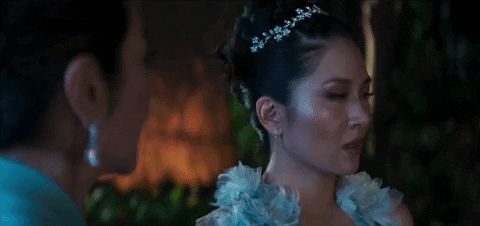 A scene from Crazy Rich Asians where Rachel Chu is looking at Elanor Sung-Young.