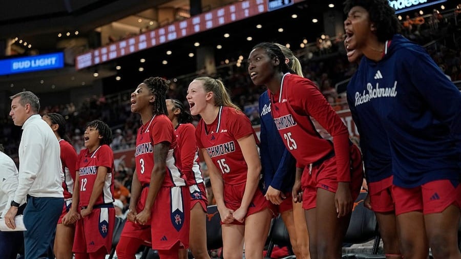 Richmond Spiders bench players react during the second half against the Texas Longhorns at Moody Center