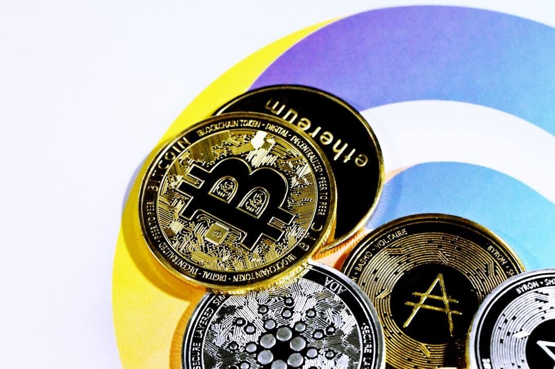 Cryptocurrency coins are together on the Quantitatives logo