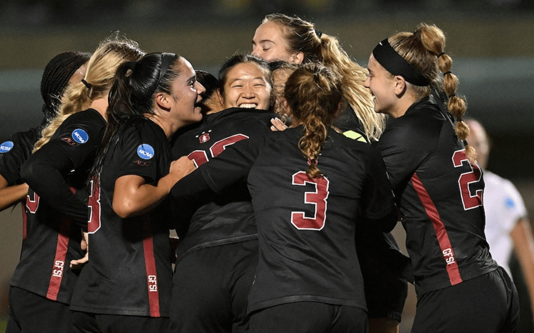 Joelle Jung #21 of the Stanford Cardinal celebrates scoring the team's second goal with teammates