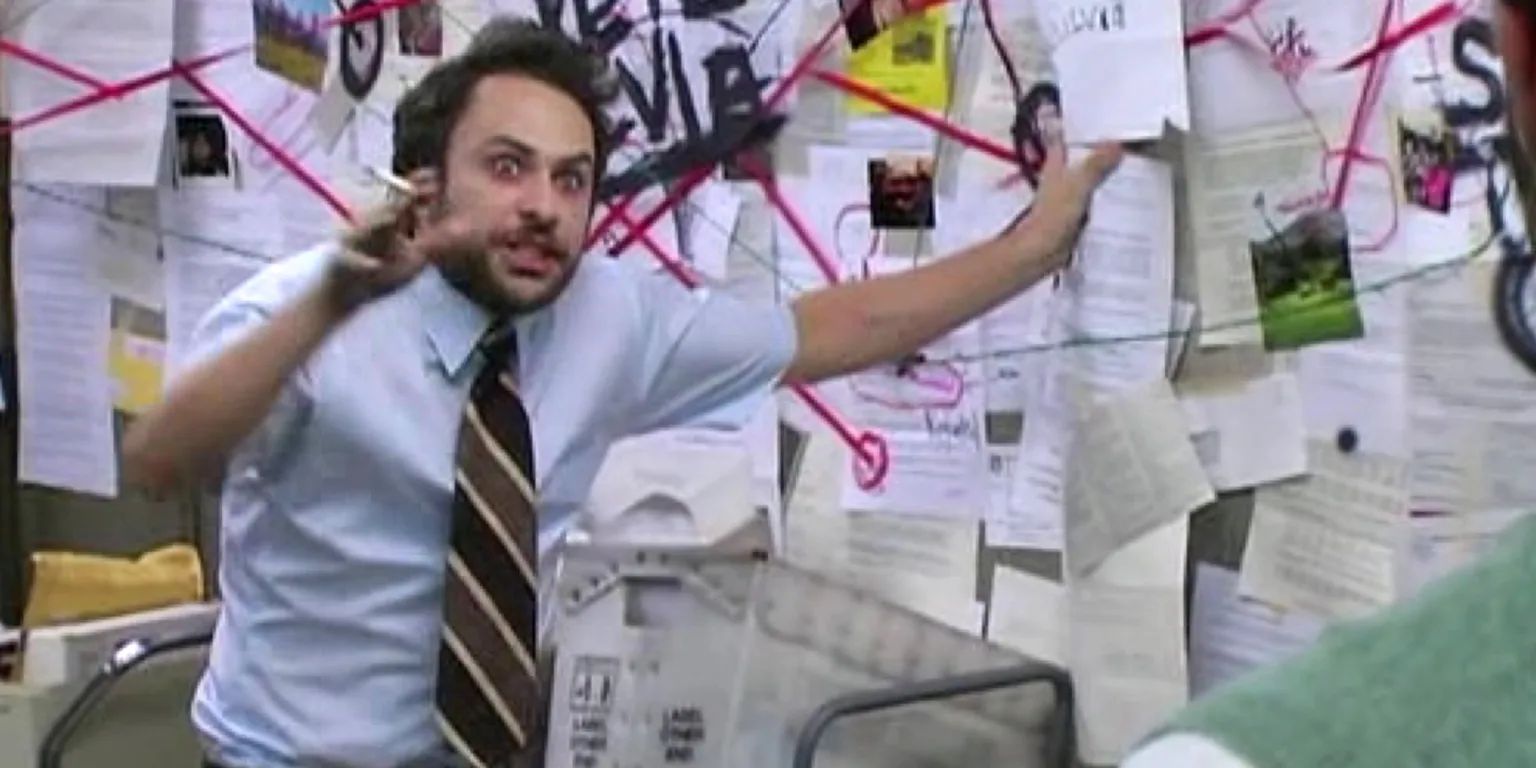 The Charlie Day meme from "It's Always Sunny in Philadelphia, in which he stands in front of a corkboard covered in papers with string connecting all the different parts of his wild theory. He is smoking a cigarette and explaining his thinking.