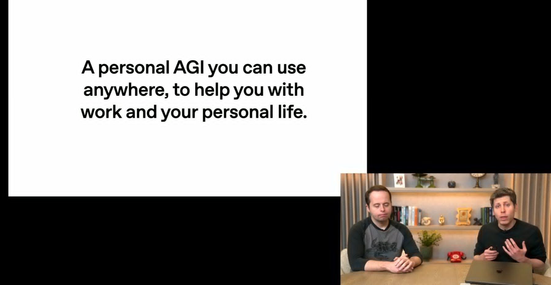 **Alt text:** Slide reading *“A personal AGI you can use anywhere, to help you with work and your personal life.”* On the right, two people sit at a desk discussing — one speaking and gesturing, the other listening — during an OpenAI livestream presentation.