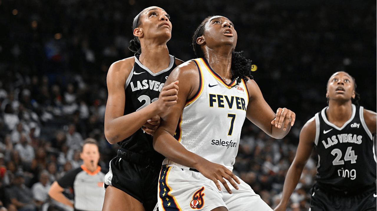 A'ja Wilson #22 of the Las Vegas Aces and Aliyah Boston #7 of the Indiana Fever waits for the rebound during the game during Round 2 Game 1 of the WNBA Playoffs on September 21, 2025 at Michelob ULTRA Arena in Las Vegas, Nevada.