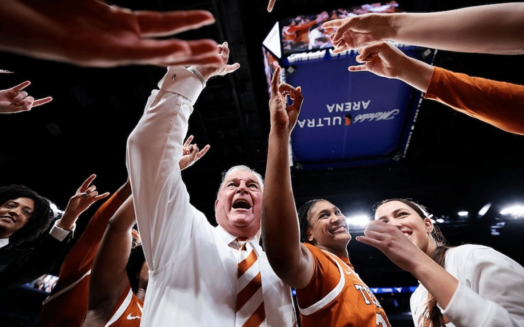  Head coach Vic Schaefer of the Texas Longhorns celebrates with his team after the Texas Longhorns defeat the South Carolina Gamecocks