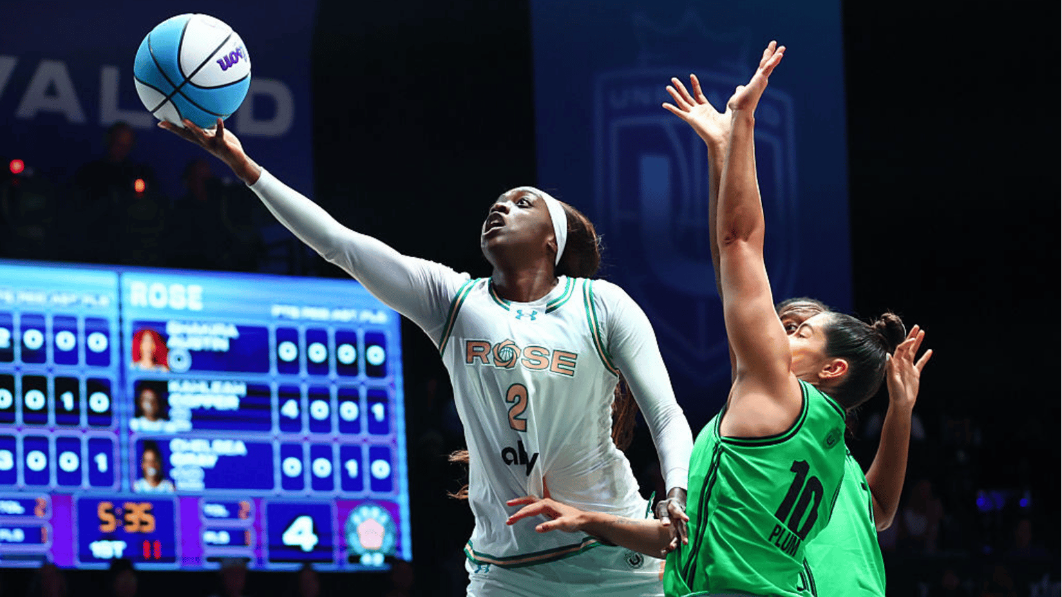 Kahleah Copper #2 of the Rose drives to the basket against Kelsey Plum #10 of the Phantom during the first quarter of the game at Sephora Arena on January 25, 2026 in Medley, Florida.