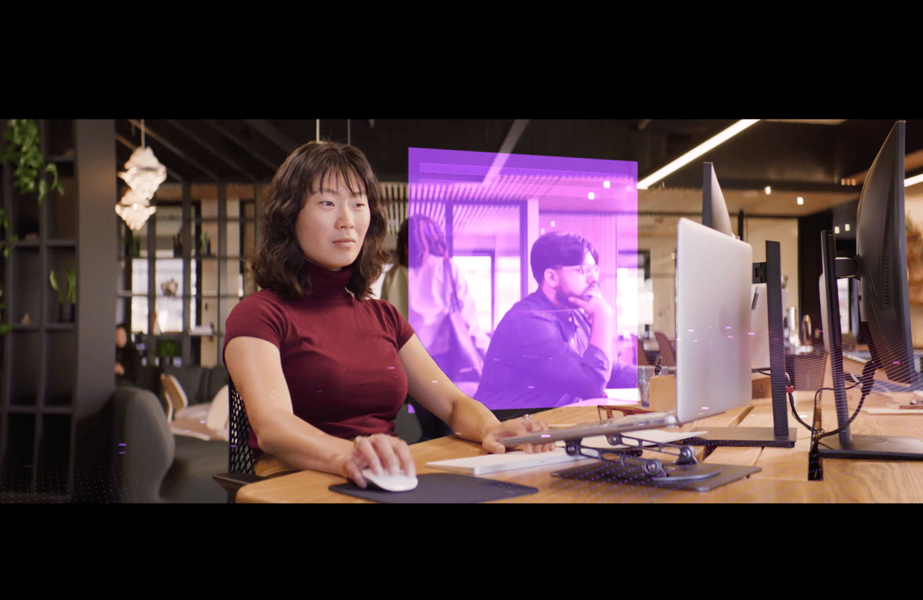 an asian woman at a computer screen