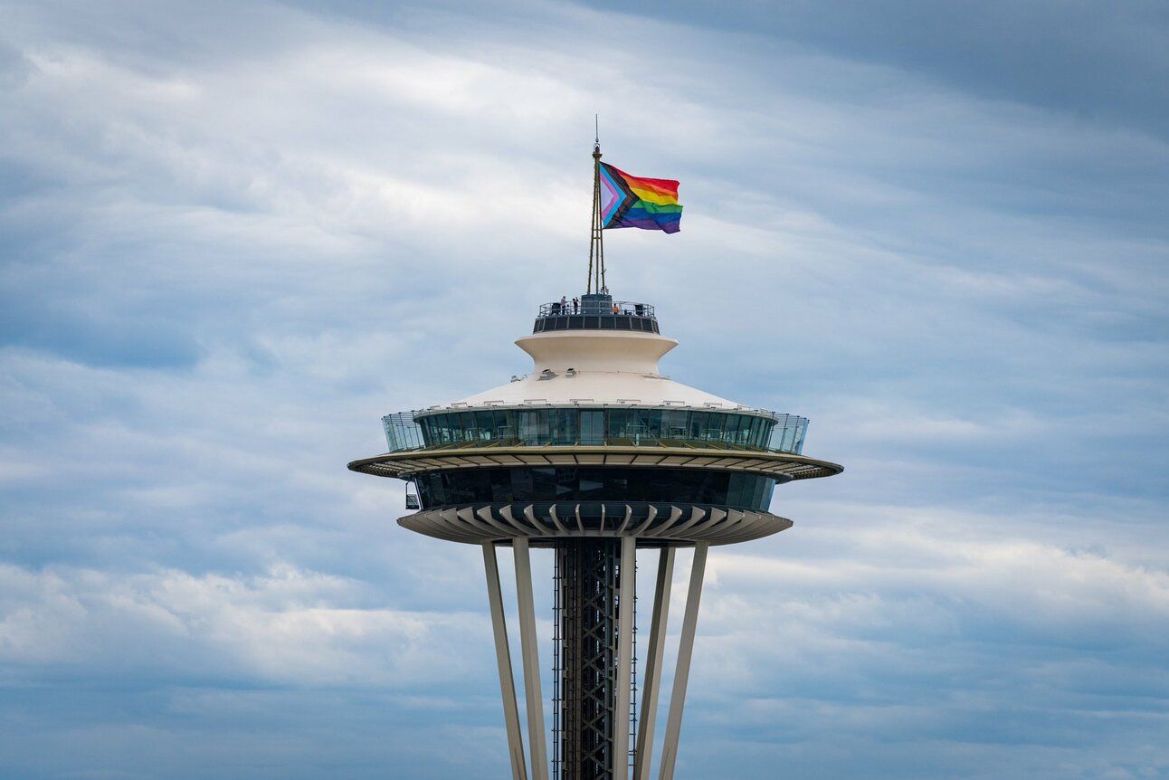 A more inclusive Pride Flag flies atop Seattle's Space Needle in 2021. The photo is from Daniel Quasar, who designed the flag.
