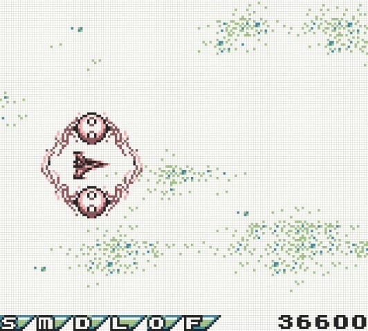 A screenshot of the Vic Viper after it's been captured by the beam from the large ship chasing it, which knocked off all of its upgrades.