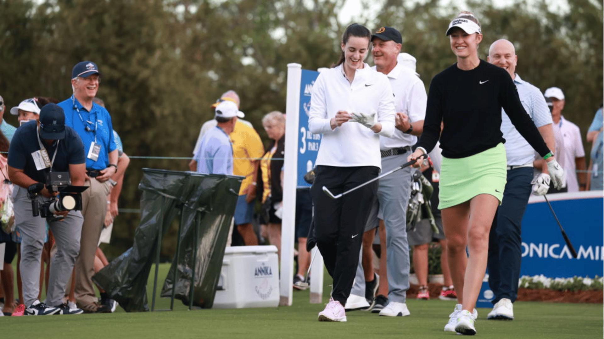 Indiana Fever guard Caitlin Clark and LPGA golfer Nelly Korda walk off the 3rd tee together on November 13, 2024, during the LPGA The ANNIKA driven by Gainbridge Pro Am at Pelican Golf Club in Belleair, Florida.