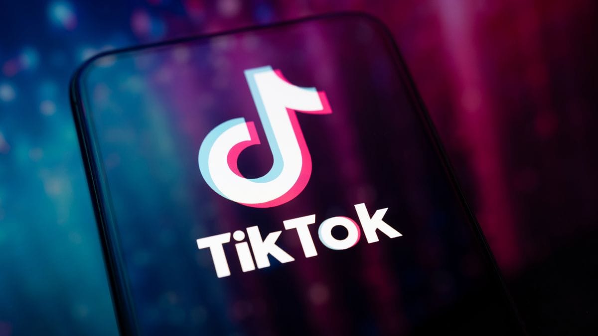 A phone shows a white musical note above the word TikTok.