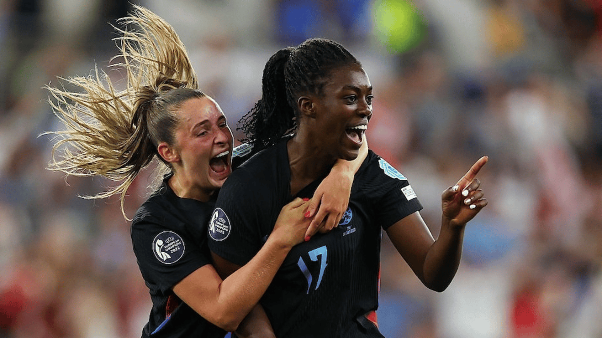 Michelle Agyemang of England celebrates scoring her team's first goal with teammate Ella Toone