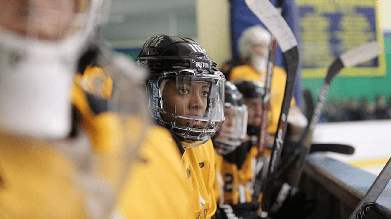Blake Bolden, (center), Boston Pride, watching from the bench