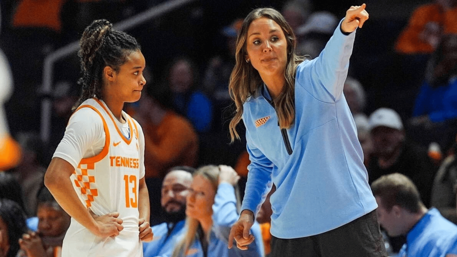 Tennessee coach Kim Caldwell talks to Tennessee guard Mia Pauldo (13) on the sidelines during a NCAA exhibition game between the Tennessee Lady Vols and Columbus State Cougars at Thompson-Boling Arena at Food City Center in Knoxville, Tennessee on Oct. 29, 2025.