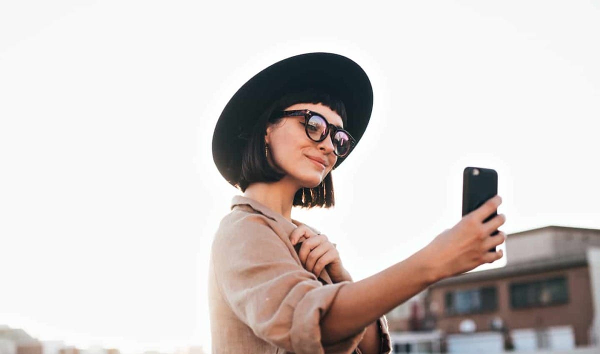Influencer taking a selfie