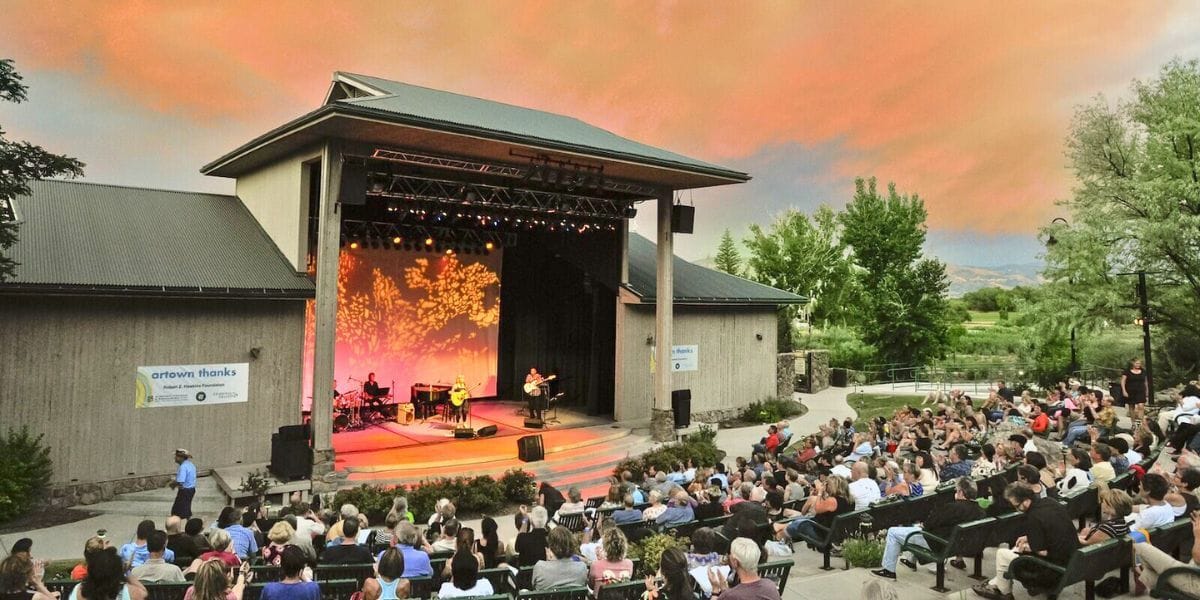 a concert performing in the park