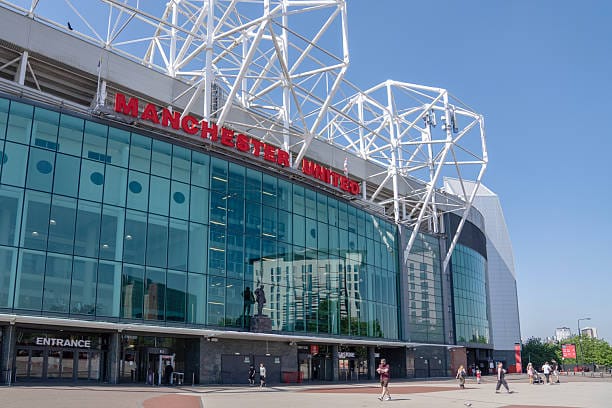 Manchester, England - May 1, 2025: Exterior of Old Trafford, the stadium that is home to Manchester United Football Club.