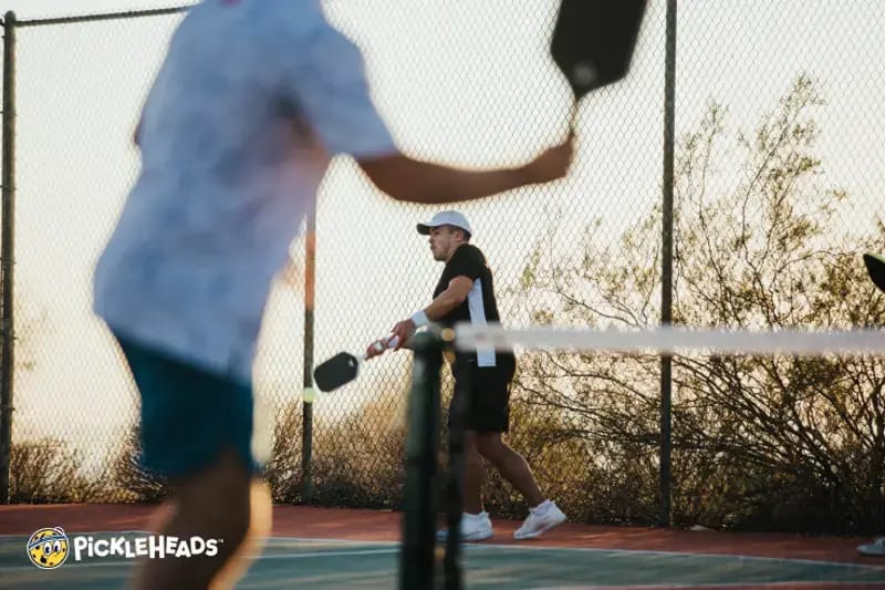 Two pickleball players on court