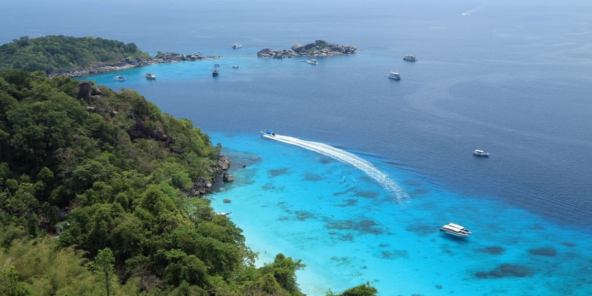 a boat boating through Similand Islands