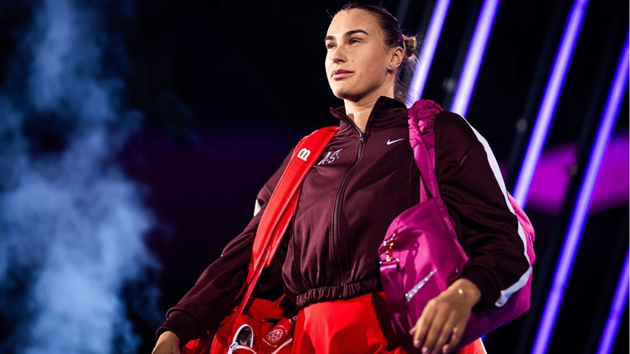 ryna Sabalenka walks onto the court to play against Jessica Pegula of the United States
