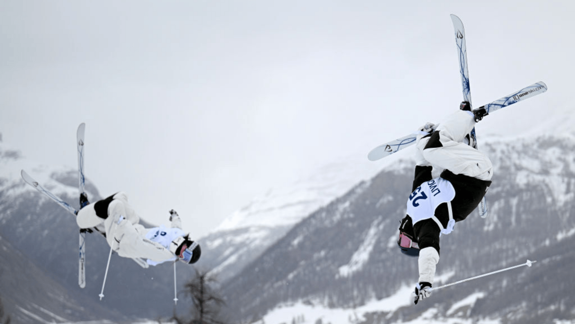 Charlotte Wilson of Team Australia (R) and Maia Schwinghammer of Team Canada compete in Heat 6 1/8 Final of the Women's Dual Moguls during the FIS World Cup Aerials & Moguls on March 12, 2025 in Livigno, Italy. The World Cup is an official test event for the XXV edition of the Winter Olympics, which will be held in Milan and Cortina d'Ampezzo in 2026. 
