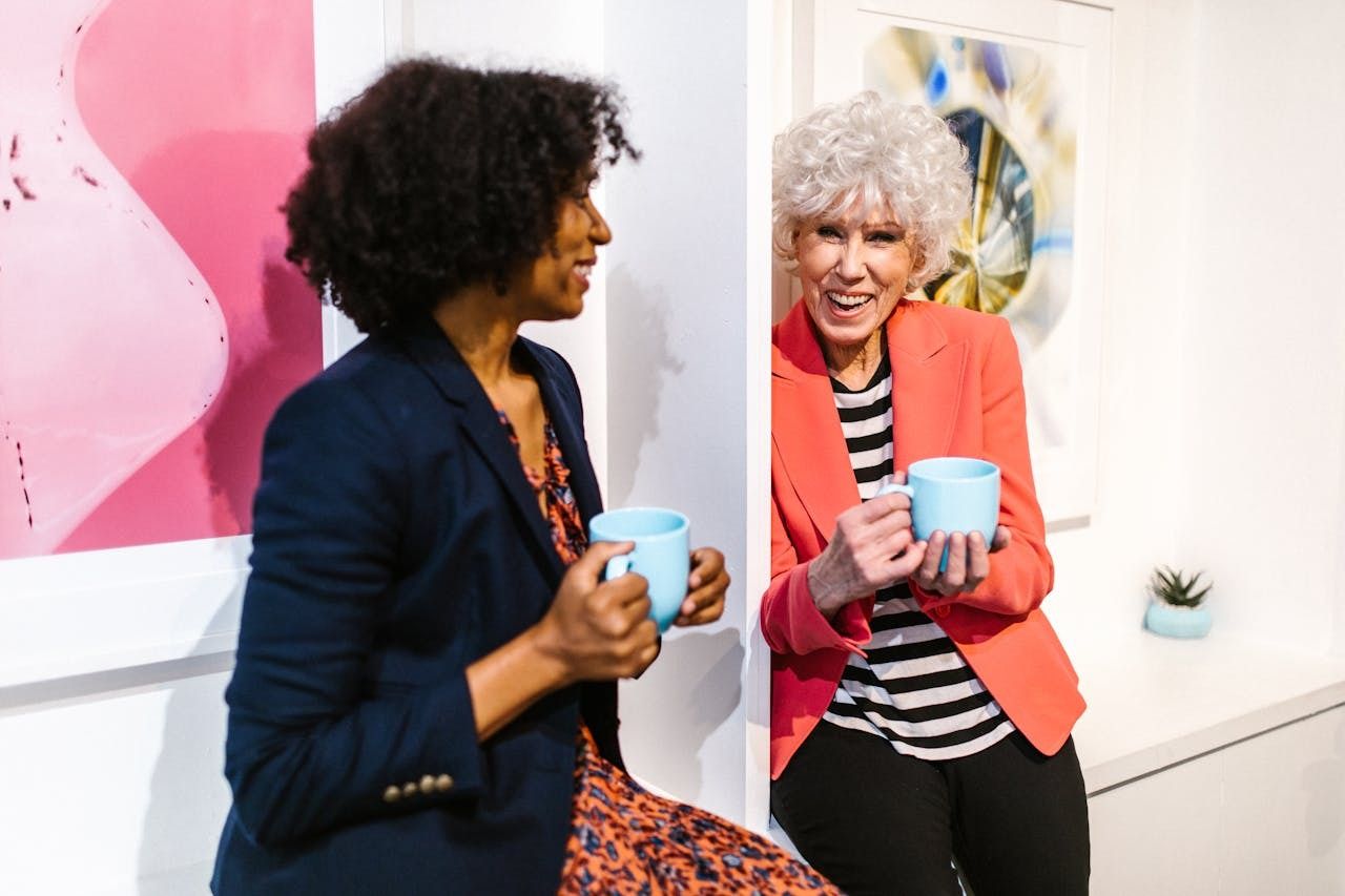 two women having a chat over tea