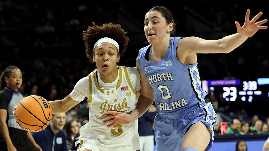 Hannah Hidalgo #3 of the Notre Dame Fighting Irish drives past Lanie Grant #0 of the North Carolina Tar Heels during the first half at Purcell Pavilion at the Joyce Center on January 11, 2026 in South Bend, Indiana. 