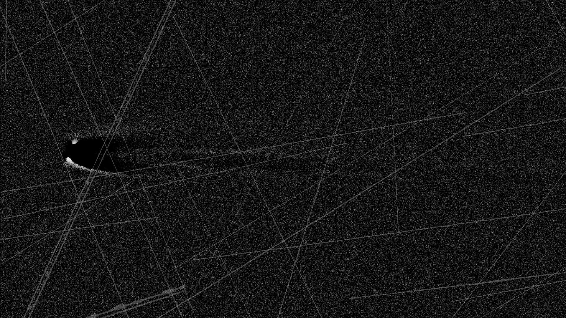 A stacked image of Comet Lemmon showing areas where bright pixels were excluded during processing. As Comet Lemmon (C/2021 A1) brightened in the Northern Hemisphere sky, astrophotographers captured its evolving coma and tail, only to find their images marred by satellite streaks. The growing number of satellites in low Earth orbit has made it increasingly difficult to obtain clean astrophotography. Observers report that nearly every subframe now contains at least one streak. To mitigate this, many rely on stacking algorithms that reject bright pixels. While effective, this workaround highlights what is becoming increasingly concerning: the accelerating impact of satellite constellations on ground-based astronomy and the need for coordinated mitigation strategies.