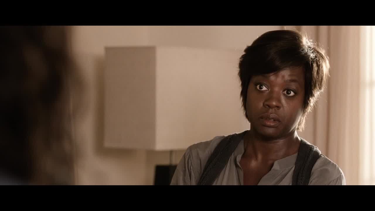 Viola Davis as teacher Nona Alberts looking determined yet weary in a school setting from 'Won't Back Down'.