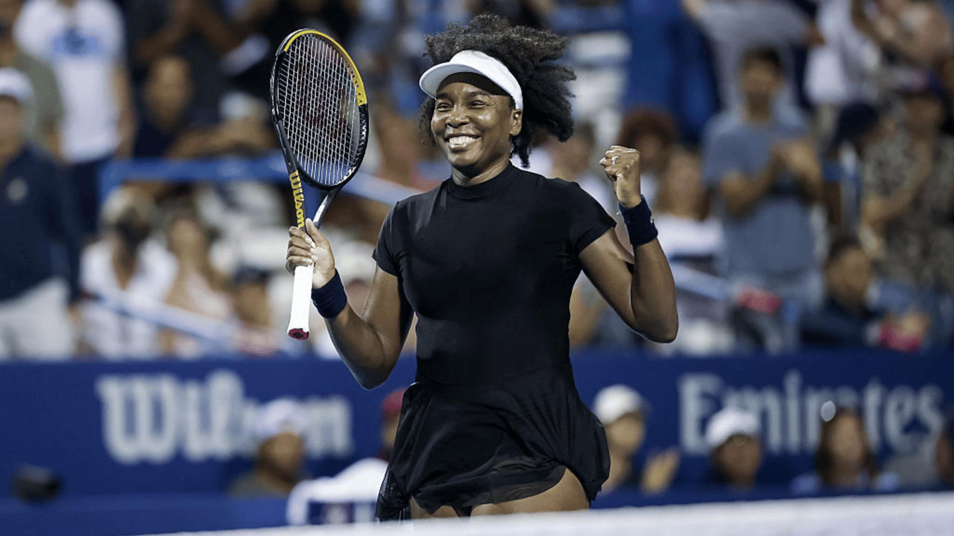 Venus Williams reacts after winning a women's single match against Peyton Stearns