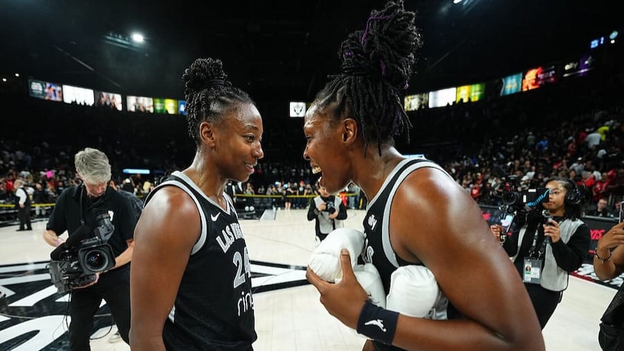 Jewell Loyd #24 and Chelsea Gray #12 of the Las Vegas Aces smiles after the game against the Seattle Storm on September 18, 2025 at Michelob ULTRA Arena 