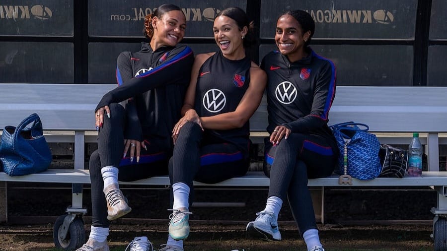 Trinity Rodman, Sophia Wilson and Naomi Girma of the United States pose for a photo before training at Stevens Stadium